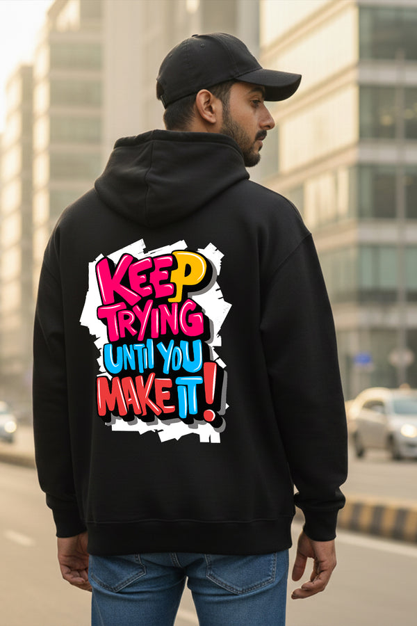 KRAZYKIND KeepTrying hoodie in black, featuring a casual fit and front logo print, made from soft, comfortable fabric.