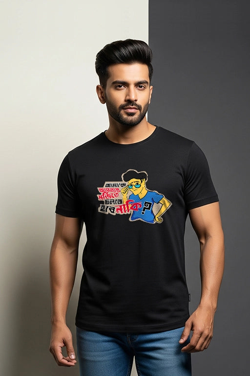 Man wearing a black t-shirt with a colorful graphic design on a gray background