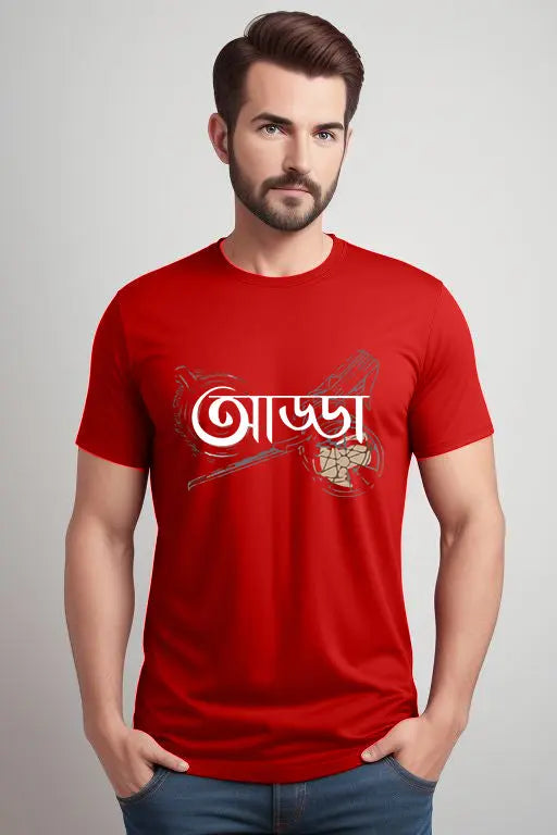 Man wearing a red t-shirt with white text and graphics on a gray background