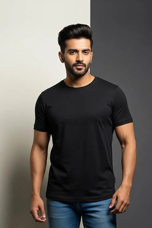 Black solid T-shirt from KRAZYKIND displayed on a hanger, showcasing a simple and comfortable casual clothing option.