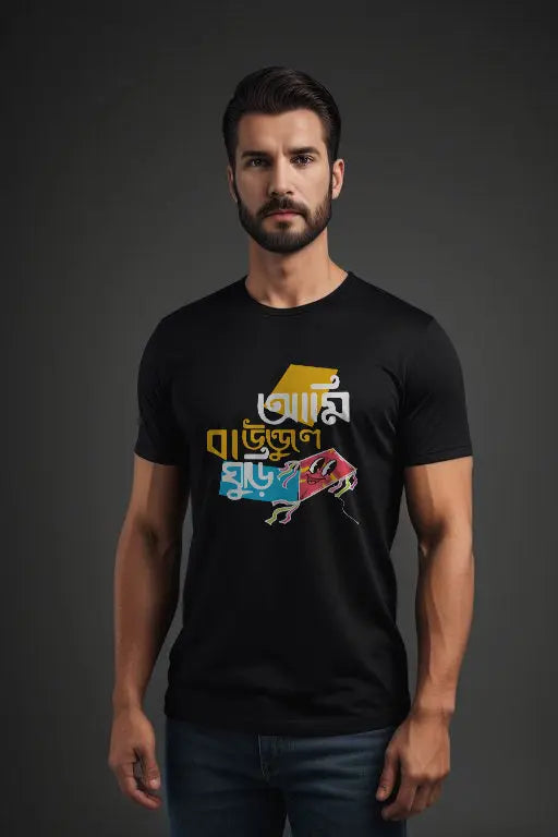 Man wearing a black t-shirt with colorful graphic design on a dark background