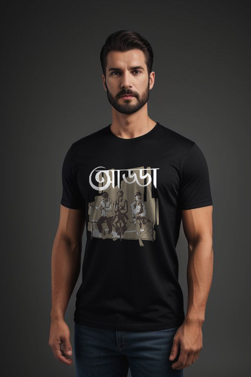 Man wearing a black t-shirt with graphic design on a dark background