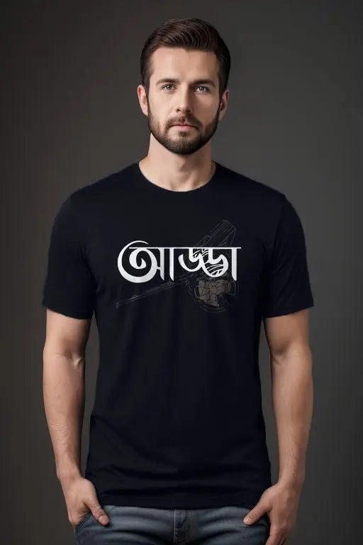 Man wearing a black t-shirt with white text on a dark background