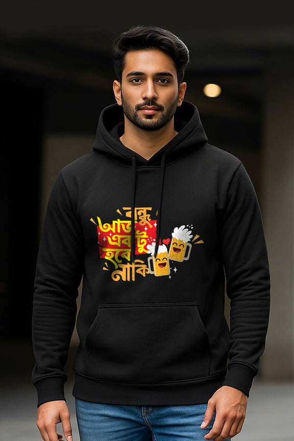 Man wearing a black hoodie with colorful graphics and text on a dark background