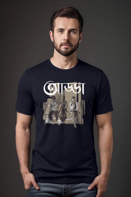 Man wearing a black t-shirt with graphic design on a dark background