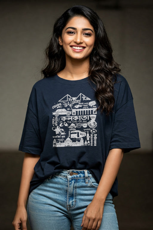 Woman wearing a navy blue t-shirt with white graphics and text, standing against a plain background