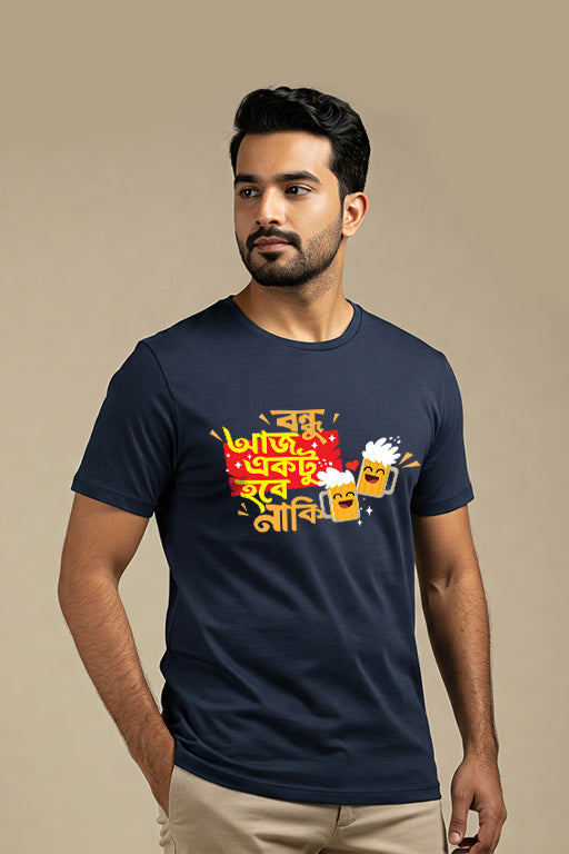 Man wearing a navy blue t-shirt with a colorful graphic design on a beige background