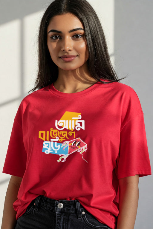 Woman wearing a red t-shirt with colorful graphics and text