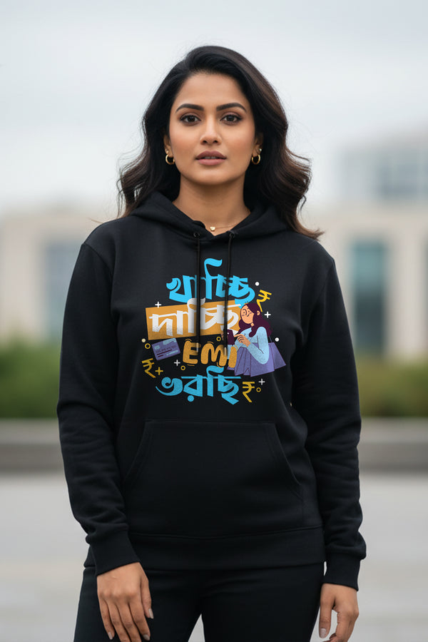 Woman wearing EMI Dichhi black hoodie by KRAZYKIND, showcasing a relaxed fit and casual style.