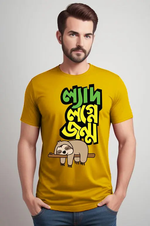 Man wearing a yellow t-shirt with a graphic design on a plain background