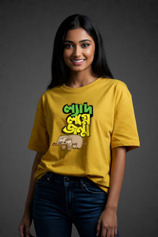 Woman wearing a yellow t-shirt with text and bear graphic on a dark background
